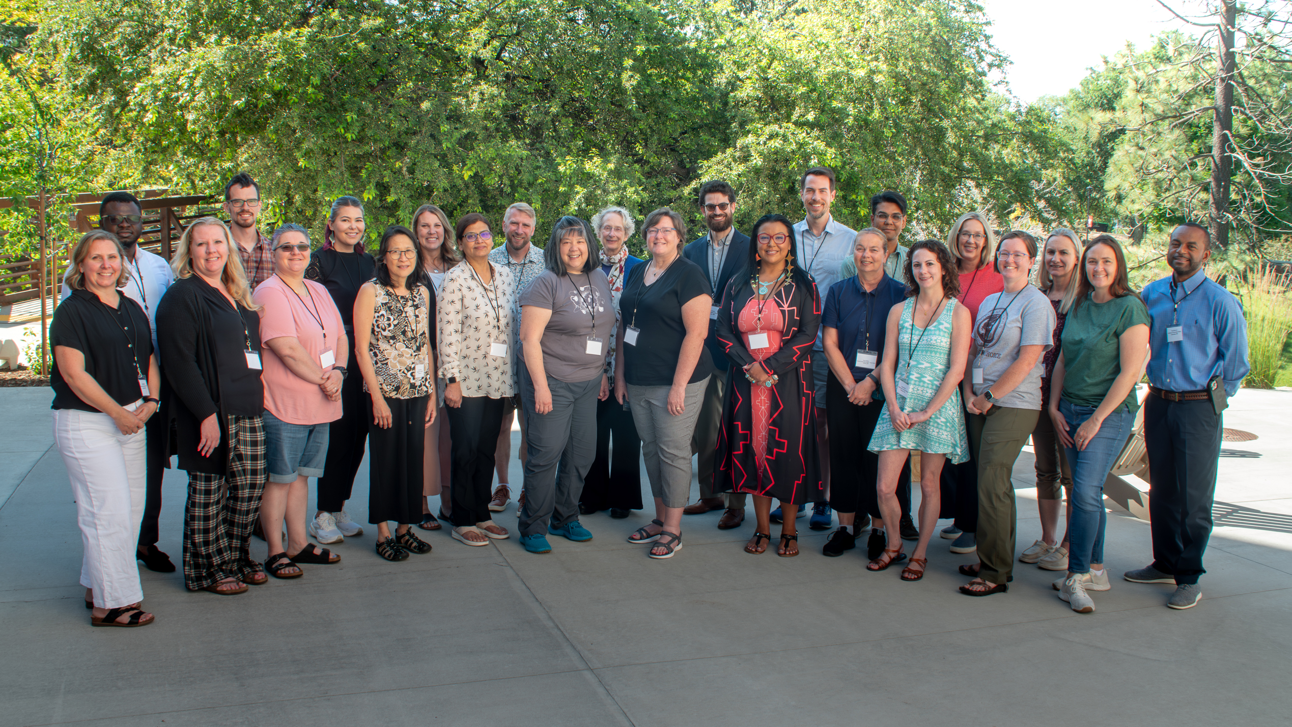 Summer Institute participants and instructors pose outside for a group photo.
