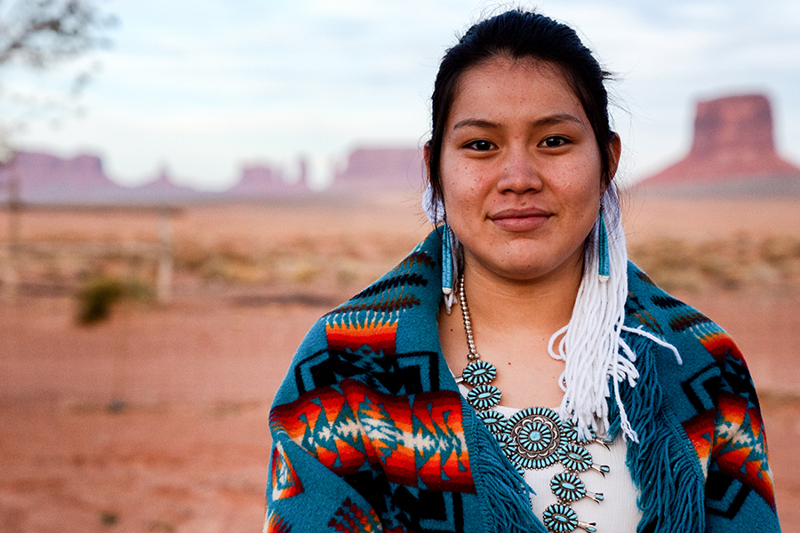 Native American Indian woman in an outdoor closeup environmental portrait.