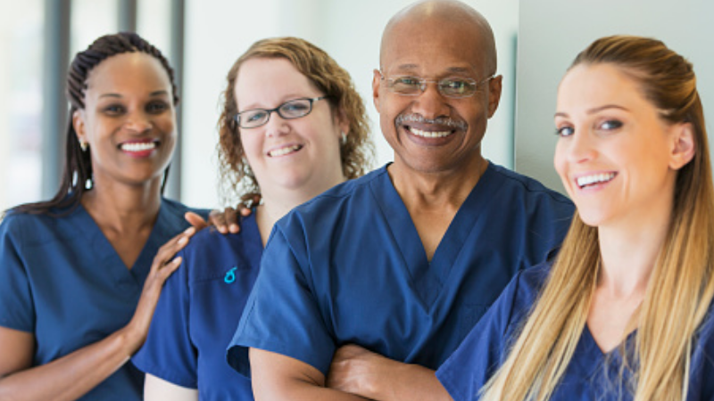 Group of nurses together, smiling